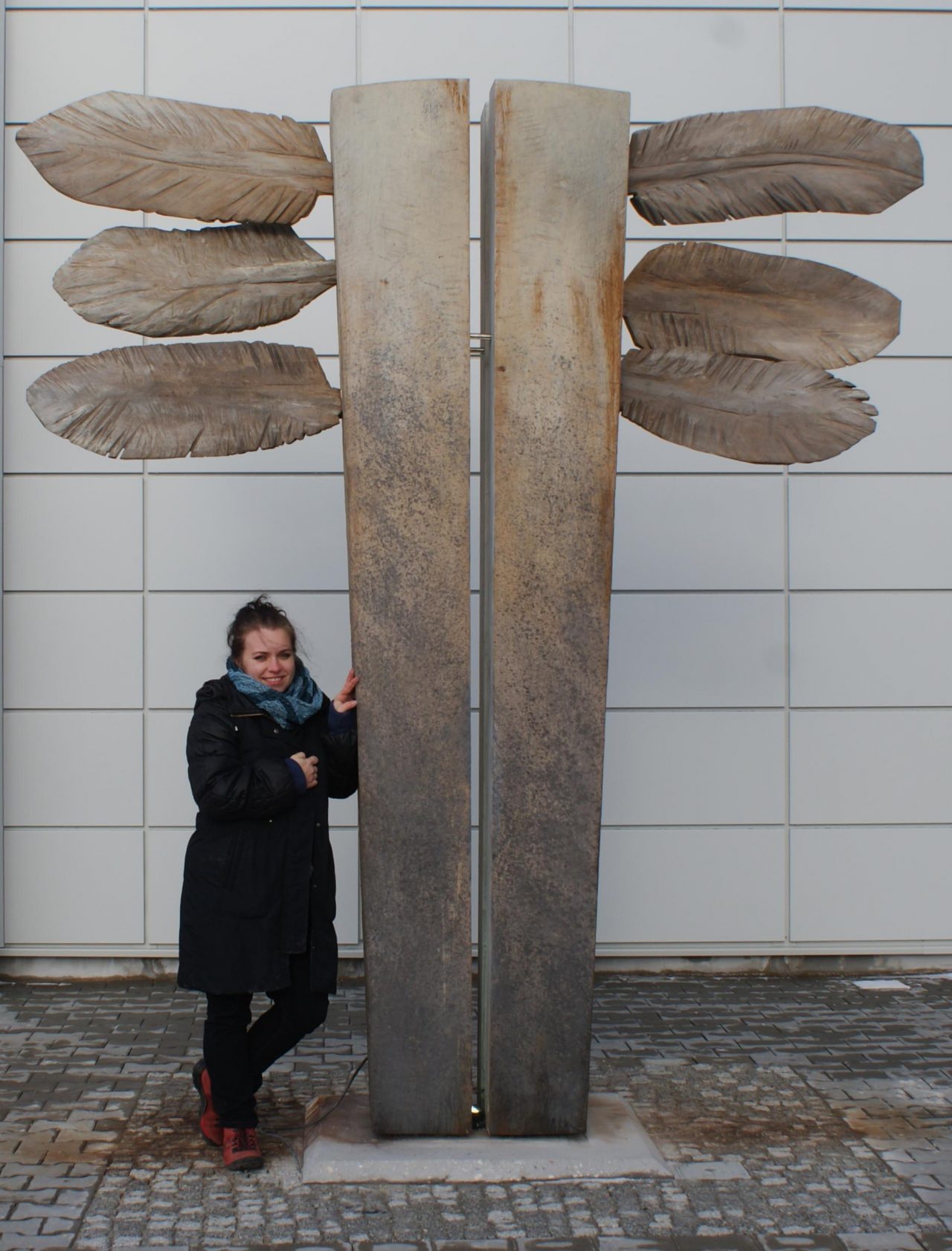 Adriana Majdzińska with his sculpture, ICARUS- wood, light, 2013, Koscierzyna, Poland